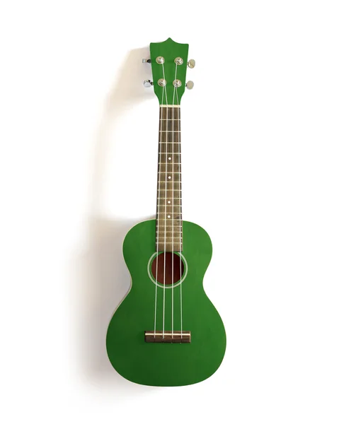 Zielony ukulele stary biały na białym tle. — Zdjęcie stockowe