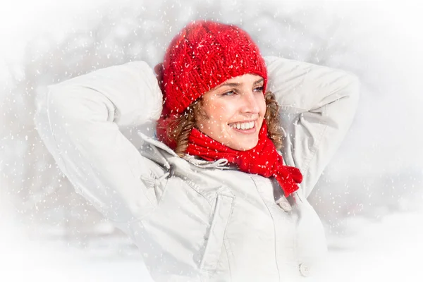 Gelukkig jonge vrouw op de dag van de sneeuw. — Stockfoto