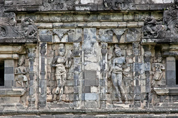 Wall on Candi Sari temple in Prambanan valley on Java. Indonesi — Stock Photo, Image