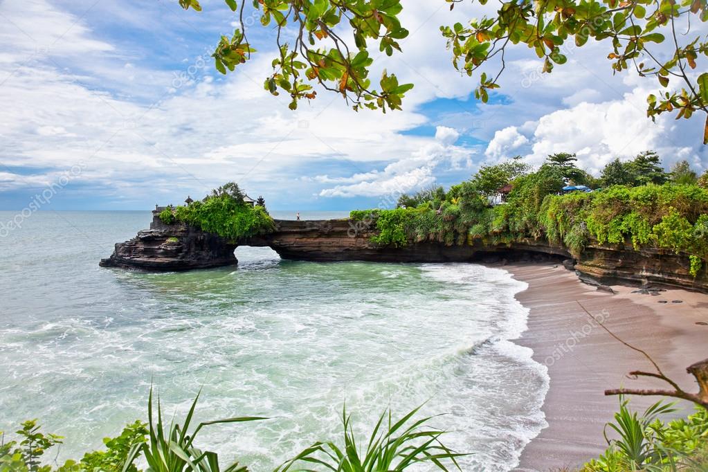 Beautiful beach and Pura Batu Bolong temple on Bali.