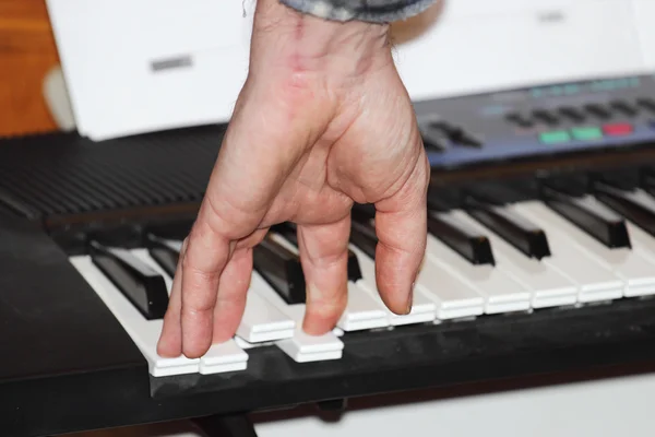Playing a MIDI controller keyboard — Stock Photo, Image