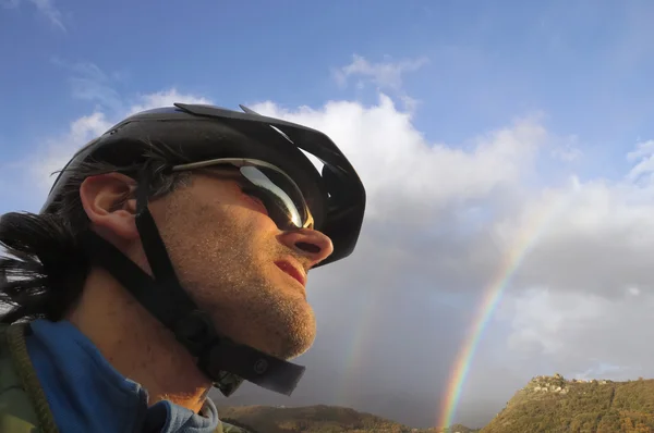 Rainbow cyclist — Stock Photo, Image