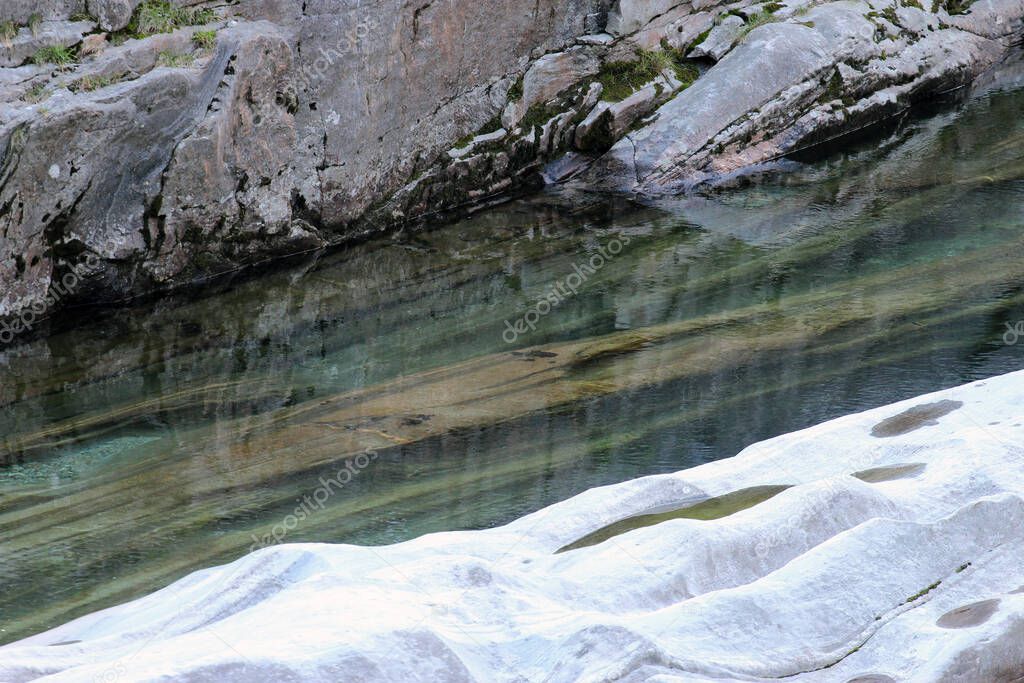 LAVERTEZZO, SWITZERLAND: Rock Formations in the clear water of the Verzasca river