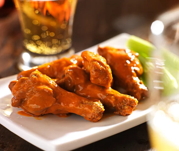 Beer and chicken wings — Stock Photo, Image