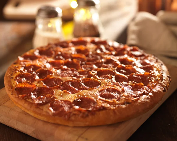 Pepperoni pizza at restaurant — Stock Photo, Image