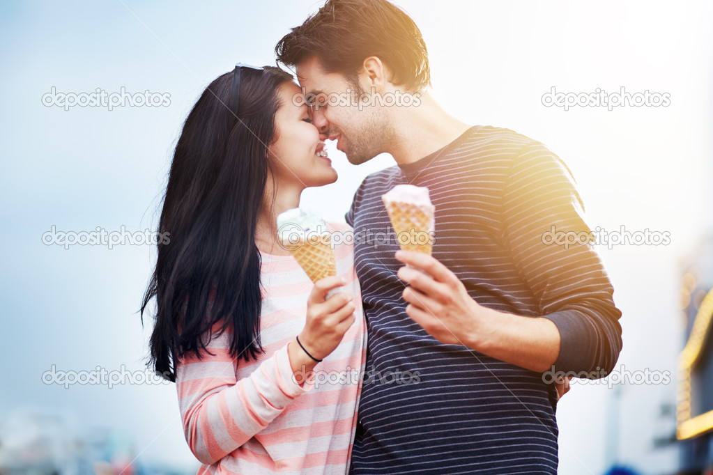 Romantic Couple With Ice Cream At Amusement Park Stock Photo By C Resnick Joshua1 32867155