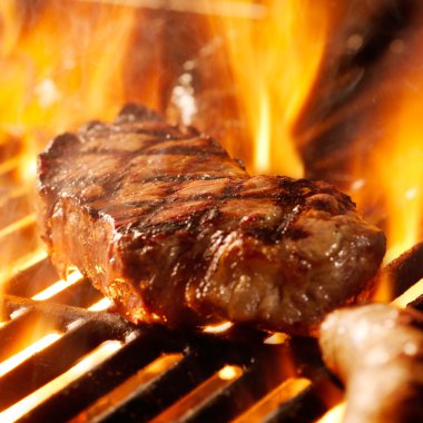 Beef steak on the grill clipart