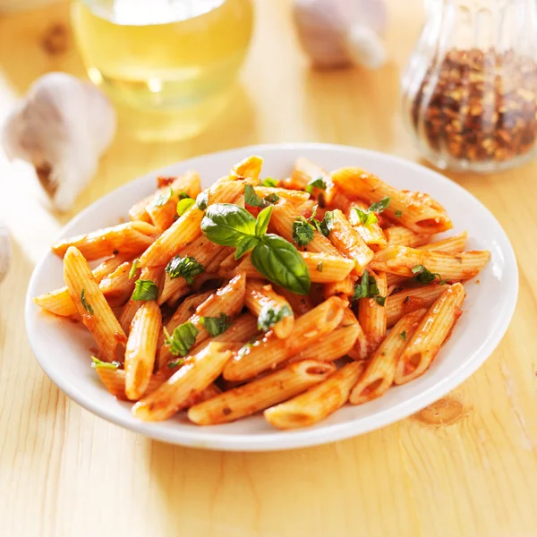 Penne pasta in sauce — Stock Photo, Image