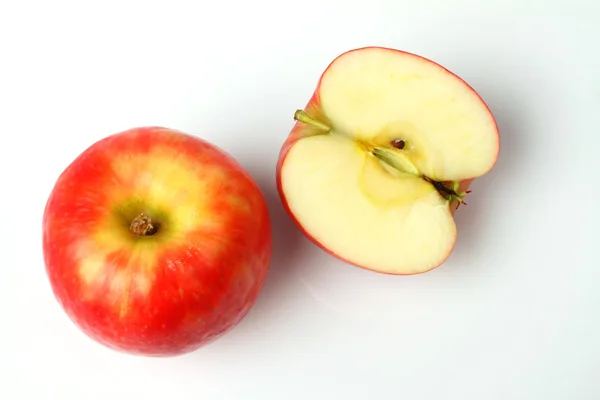 Egy piros alma és szelet — Stock Fotó