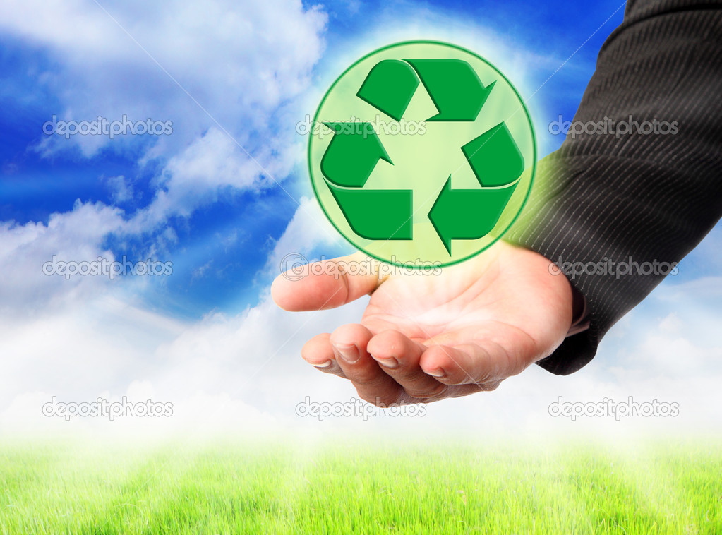 Recycling symbol on a man's hand.