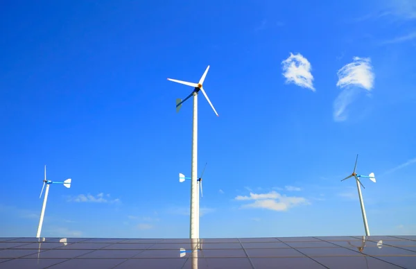 Wind turbine and solar energy panels — Stock Photo, Image