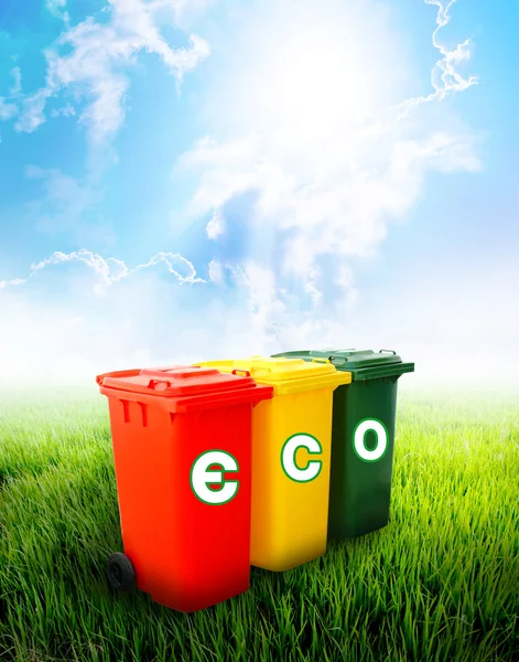 Eco wording on colorful recycle bins — Stock Photo, Image