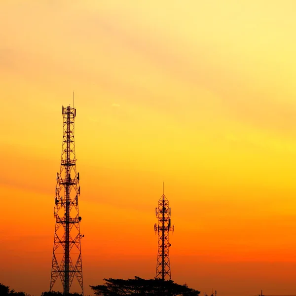 Telecommunication tower at sunset — Stock Photo, Image