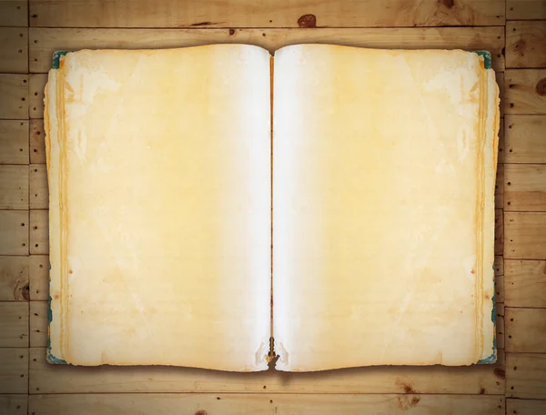 Livro vintage no velho fundo de madeira cortando caminho . — Fotografia de Stock