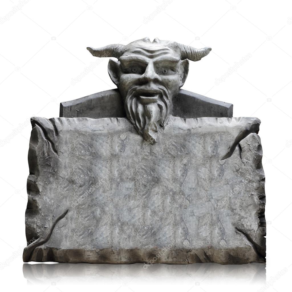 Stone sign board with devil head, copy space and clipping path.