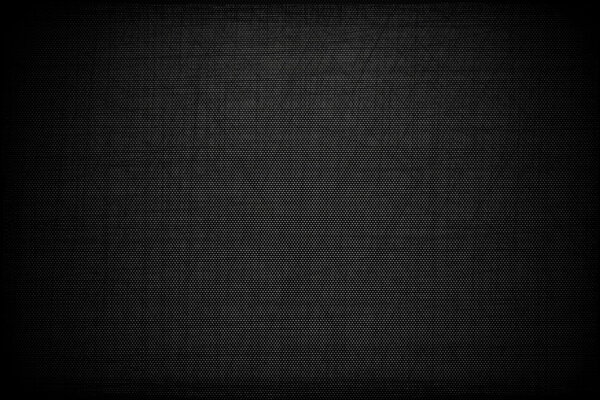 Черный фон с царапанной углеродной текстурой
