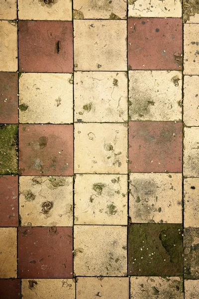 Grunge background of cracked tiles — Stock Photo, Image