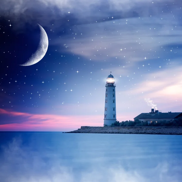 Phare la nuit Photos De Stock Libres De Droits