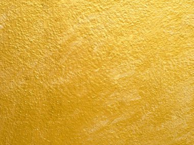 Abstract gold wall grunge background texture design paint on cement wall