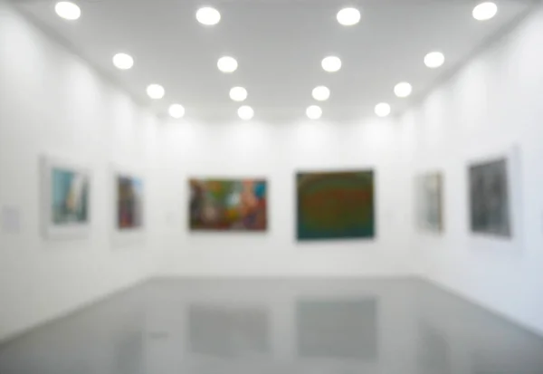 Blurred background of exhibition in modern art gallery, art exhibition gallery hall