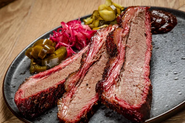 hot appetizer cuts of smoked beef with pickled vegetables american food