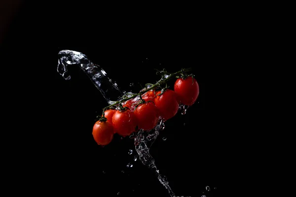 Freeze Motion Cherry Tomatoes Black Background Splashing Water — ストック写真