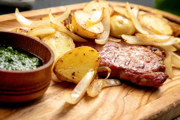 Fried Steak Served Potatoes Onions Dark Background — Stock Photo, Image