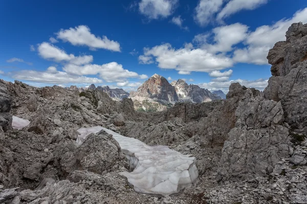 Snow in the mountains - the Dolomites summer. — Stock Photo, Image
