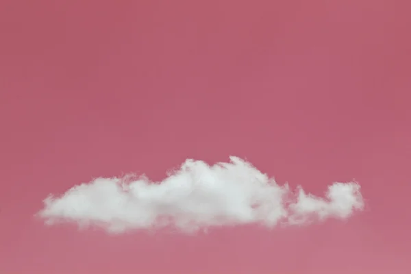 Біла хмара в рожевому бездоріжжі — стокове фото