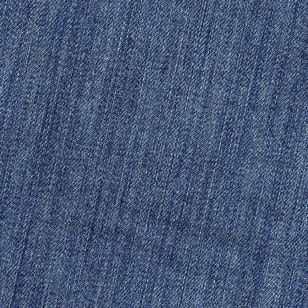 Texture of blue jeans textile — Stock Photo, Image