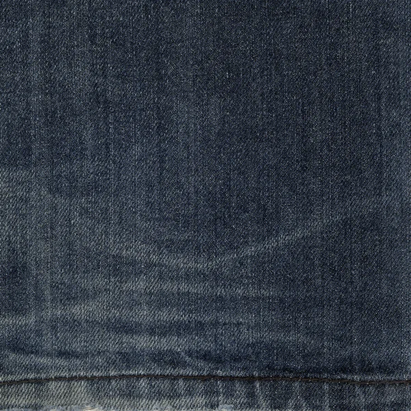 Tekstura niebieskie dżinsy włókienniczych — Zdjęcie stockowe