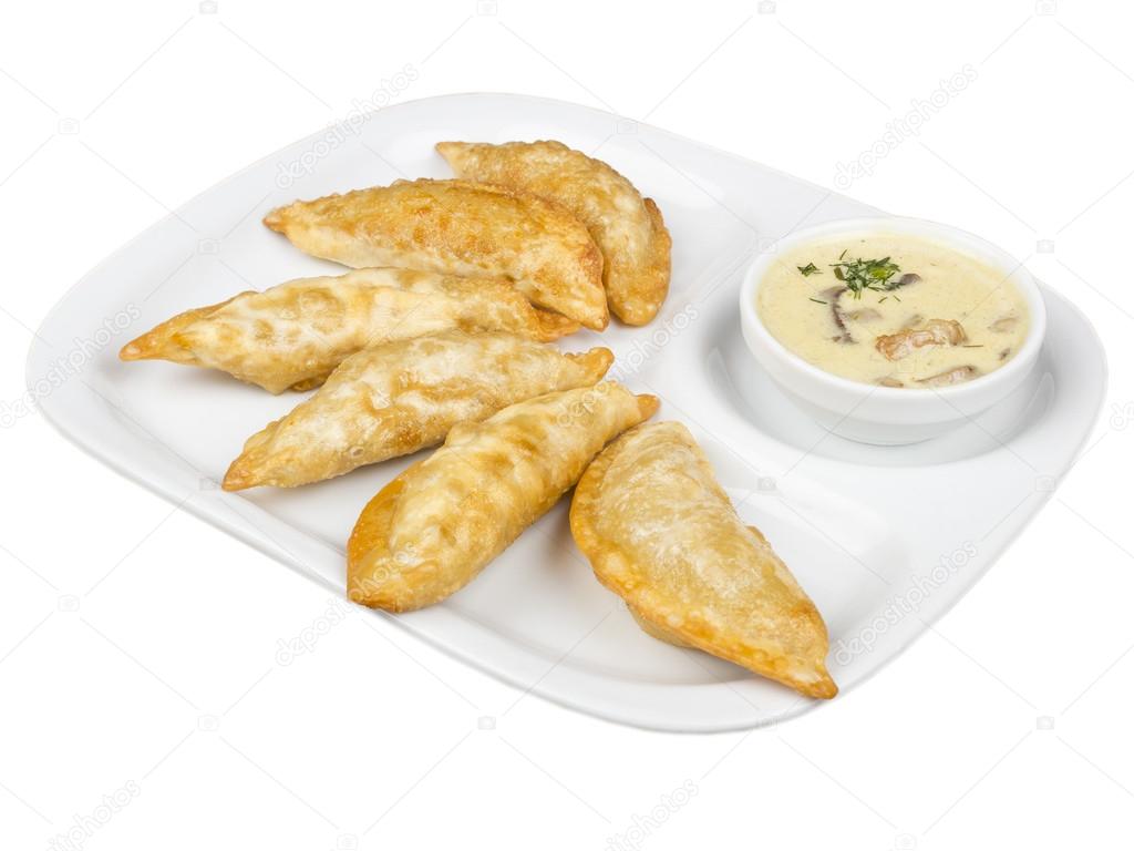 Fried Dumpling - Gyoza. Garnished with Sauce