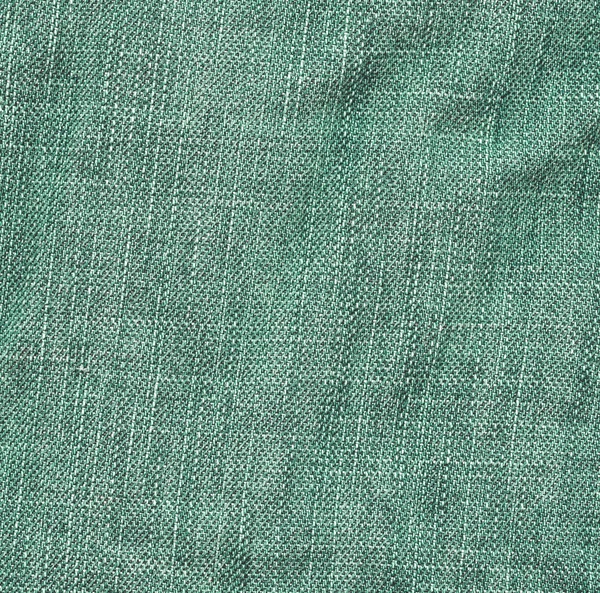 Green denim crumpled fabric — Stock Photo, Image