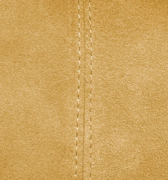 Yellow leather texture, stitch. — Stock Photo, Image