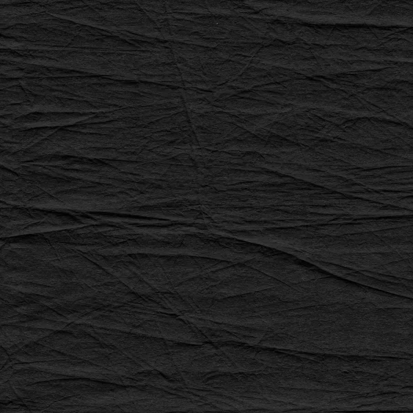 Black crumpled paper texture — Stock Photo, Image