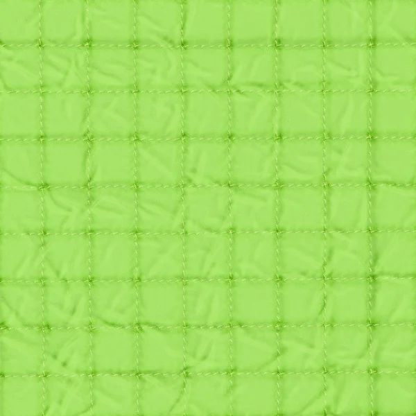 Tekstil doku, arka planı yeşil kareler — Stok fotoğraf