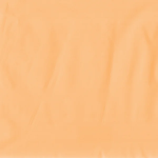 Buruşuk turuncu malzeme arka plan — Stok fotoğraf