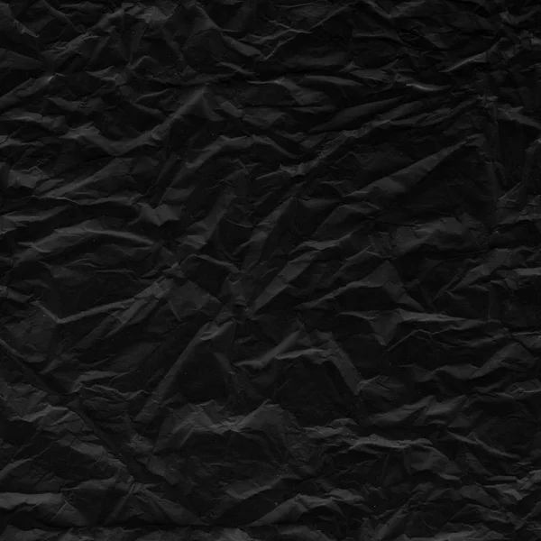 Zerknülltes schwarzes Papier — Stockfoto