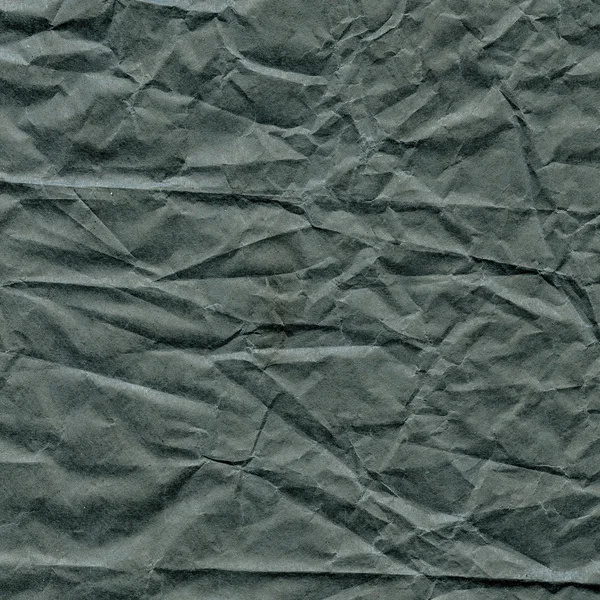 Black crumpled paper closeup — Stock Photo, Image