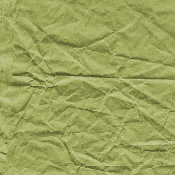 Green crumpled paper closeup — Stock Photo, Image