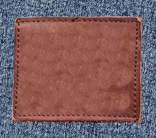 Blank reddish leather label — Stock Photo, Image