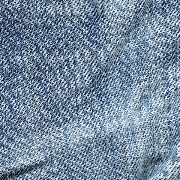 Worn tecido jeans azul — Fotografia de Stock