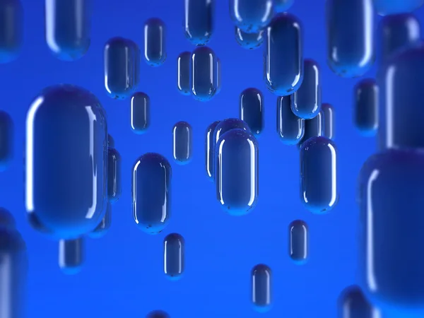 Blue pills falling — Stock Photo, Image