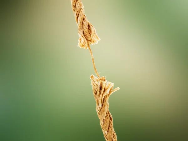 Розтягнута мотузка, що розривається на дві частини , Стокове Фото