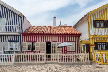 Costa Nova do Prado, Portugal. The famous colored wooden houses known as palheiros
