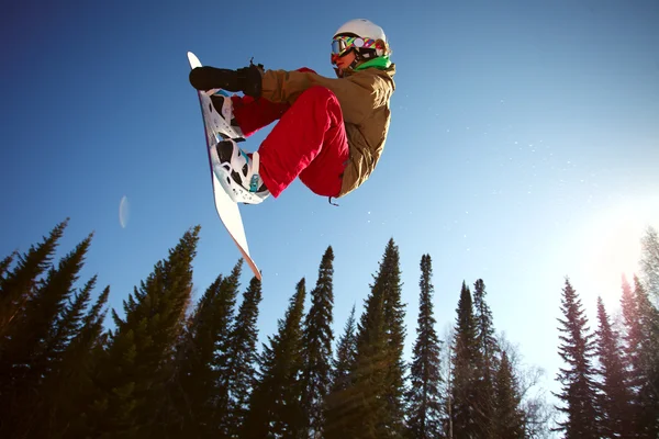 Saut de snowboarder — Photo