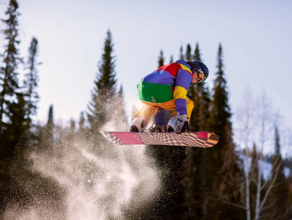 Salto de snowboarder — Fotografia de Stock