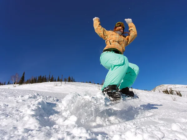 Salto de snowboarder — Fotografia de Stock