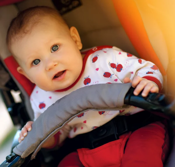 Baby in sitting stroller — Stock Photo, Image