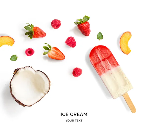 Creative layout made of fruit ice cream, strawberry, raspberry and coconut. Flat lay. Food concept. Ice cream and fruits on white background.